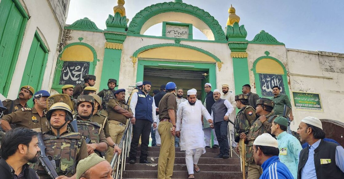 Devotees leave after offering prayers at the Shahi Jama Masjid amid tight security, in Sambhal. Photo: PTI