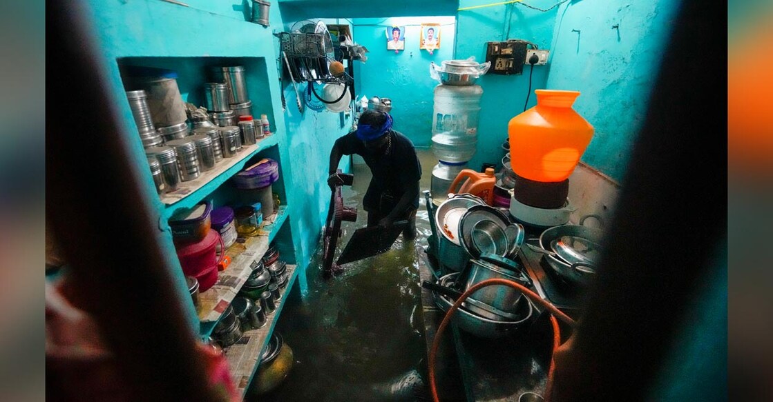 A house is seen inundated with rainwater after heavy rainfall, in Chennai following Cyclone Fengal induced heavy downpour. Photo: PTI/R Senthilkumar