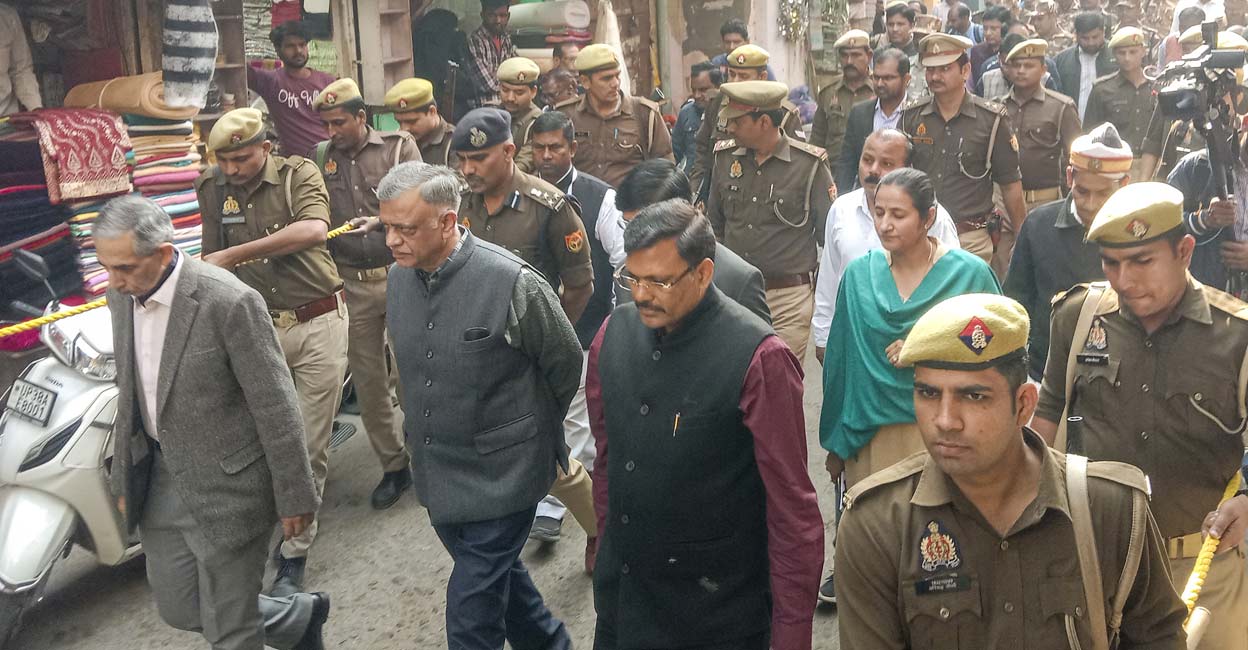 A three-member judicial commission visits the Shahi Jama Masjid on Sunday. Photo: PTI 