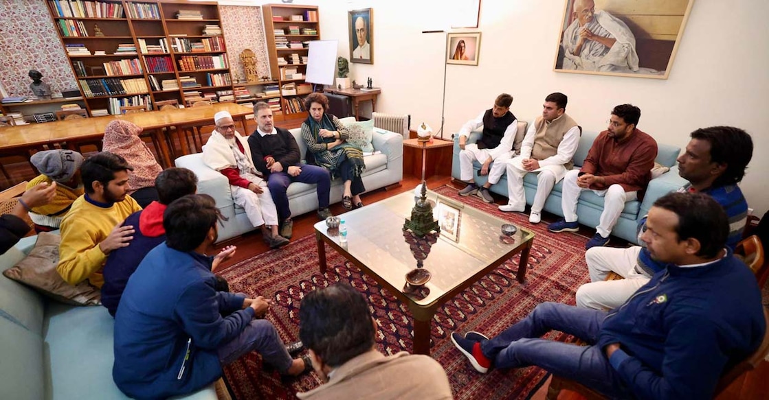 rahul-gandhi-priyanka-gandhi Rahul Gandhi and Priyanka Gandhi Vadra with families of the victims of violence in Sambhal. Photo: PTI