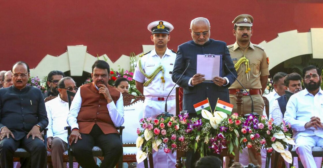 Maharashtra Governor CP Radhakrishnan, Chief Minister Devendra Fadnavis, Deputy Chief Ministers Ajit Pawar and Eknath Shinde and others during the swearing-in ceremony of cabinet ministers at Raj Bhavan, in Nagpur. Photo: PTI