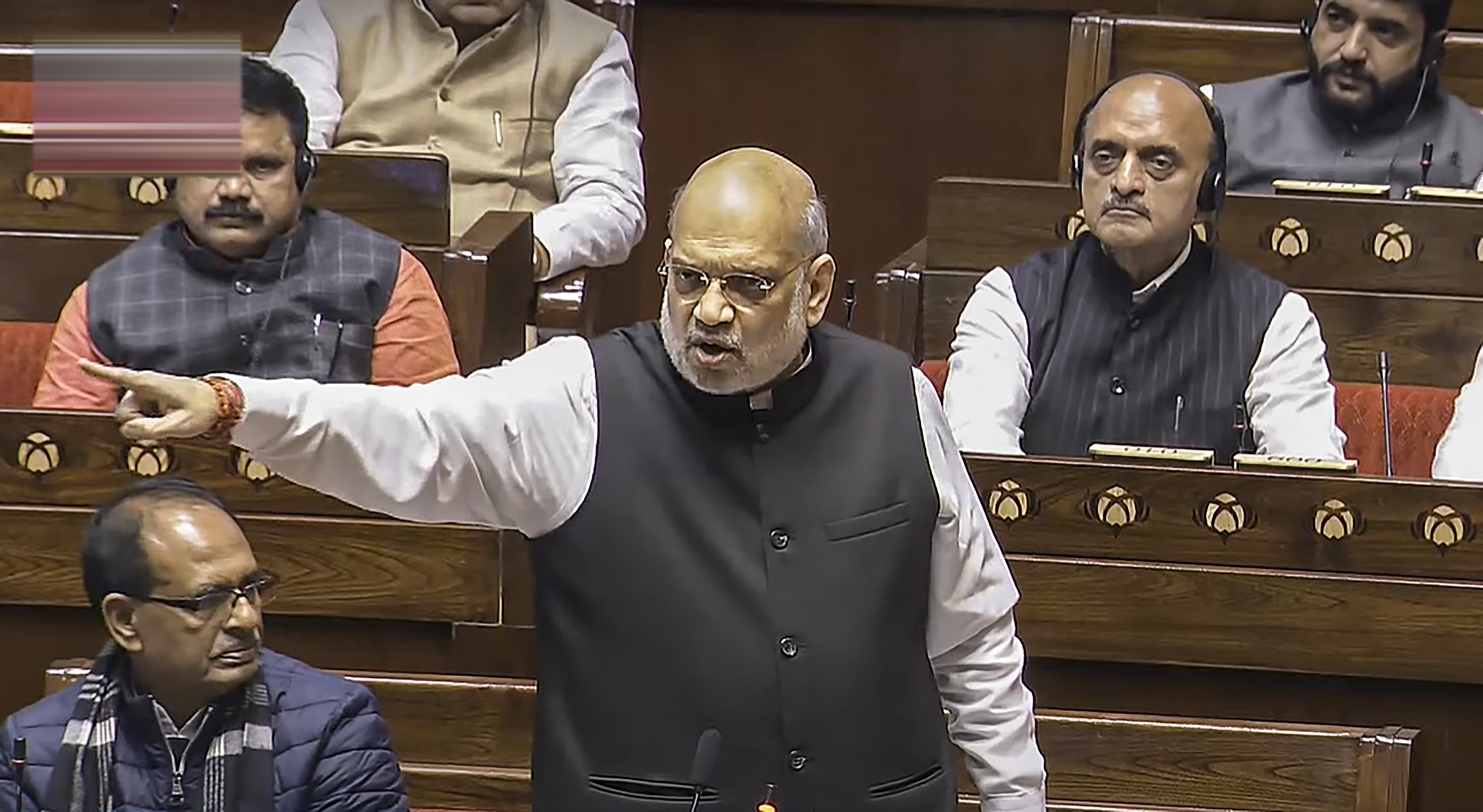 Union Home Minister Amit Shah speaks during the Constitution debate in the Rajya Sabha amid the Winter session of Parliament, in New Delhi, Tuesday, December 17, 2024. Photo: PTI