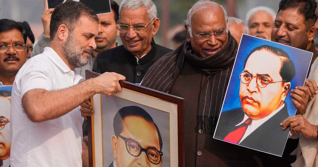 New Delhi: LoP in the Rajya Sabha Mallikarjun Kharge and LoP in the Lok Sabha Rahul Gandhi take part in a protest of opposition MPs demanding Union Home Minister Amit Shah's apology for his remarks which they claimed were an insult to B.R. Ambedkar, during the Winter session of Parliament, in New Delhi, Wednesday, Dec. 18, 2024. (PTI Photo/Ravi Choudhary)(PTI12_18_2024_000280A)