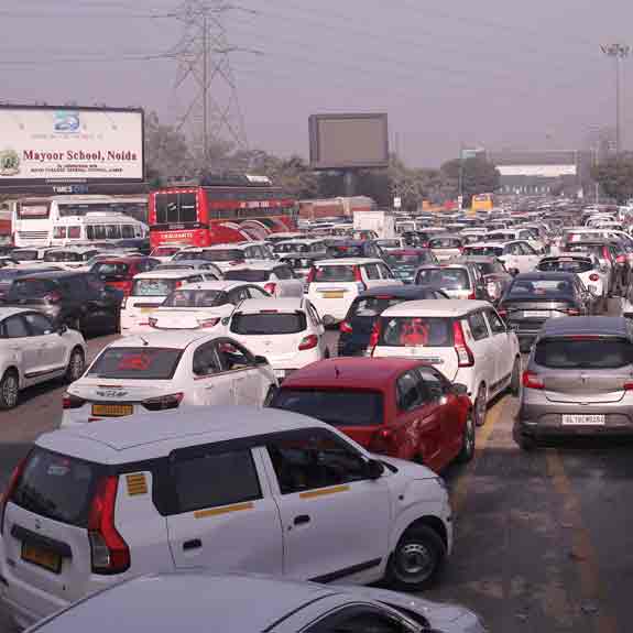 Vehicles stuck in a traffic jam on Delhi-Noida Direct Flyway after security was heightened in view of farmers' protest march towards the national capital, in Noida, Monday, Dec. 2, 2024. Photo: PTI