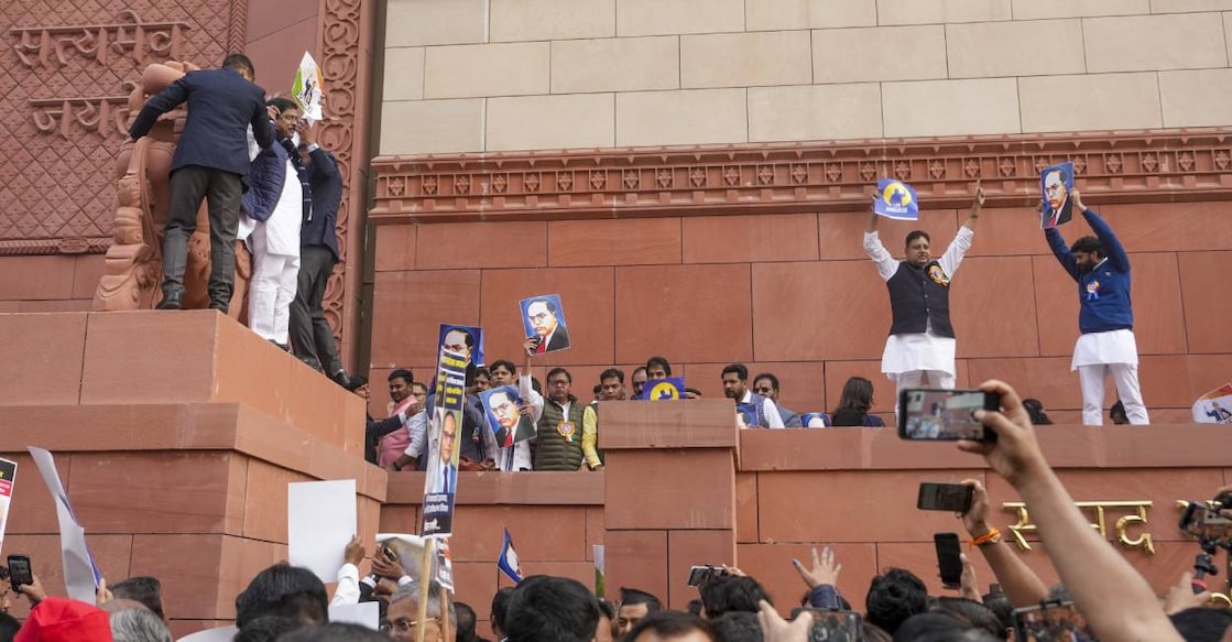 INDIA bloc members during a protest in Parliament premises demanding the resignation of Home Minister Amit Shah for his remarks related to B R Ambedkar, in New Delhi. Photo: PTI