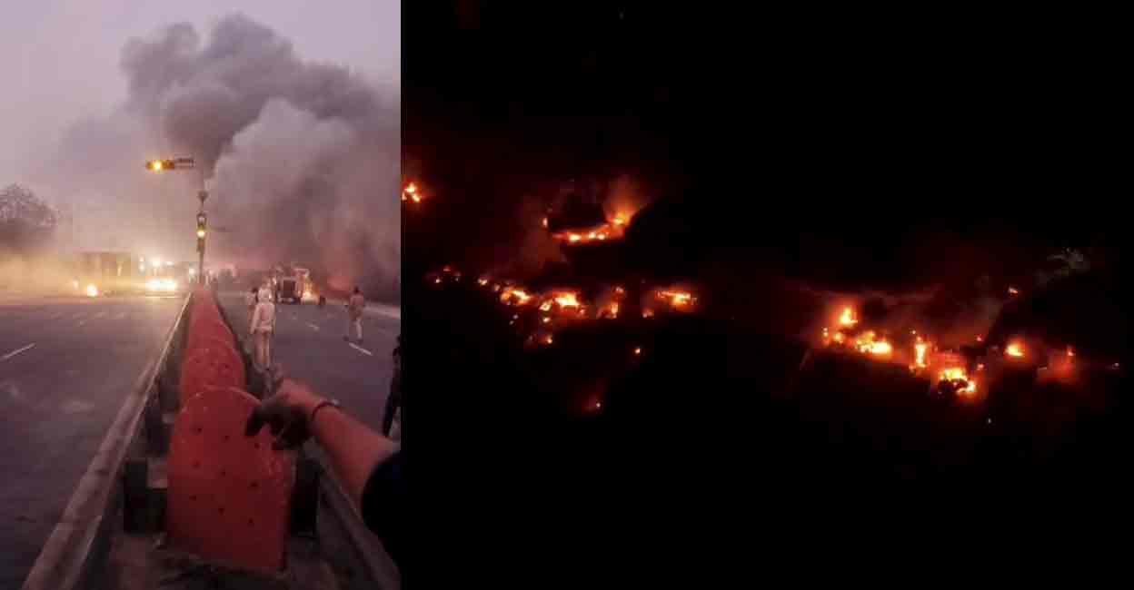 Vehicles engulfed in flames after a massive fire broke out following a truck collision outside a petrol pump, in Jaipur, Friday morning, Deec. 20, 2024. The incident took place when a CNG tanker parked at the petrol pump caught fire after a truck collided with other trucks. Photo: PTI