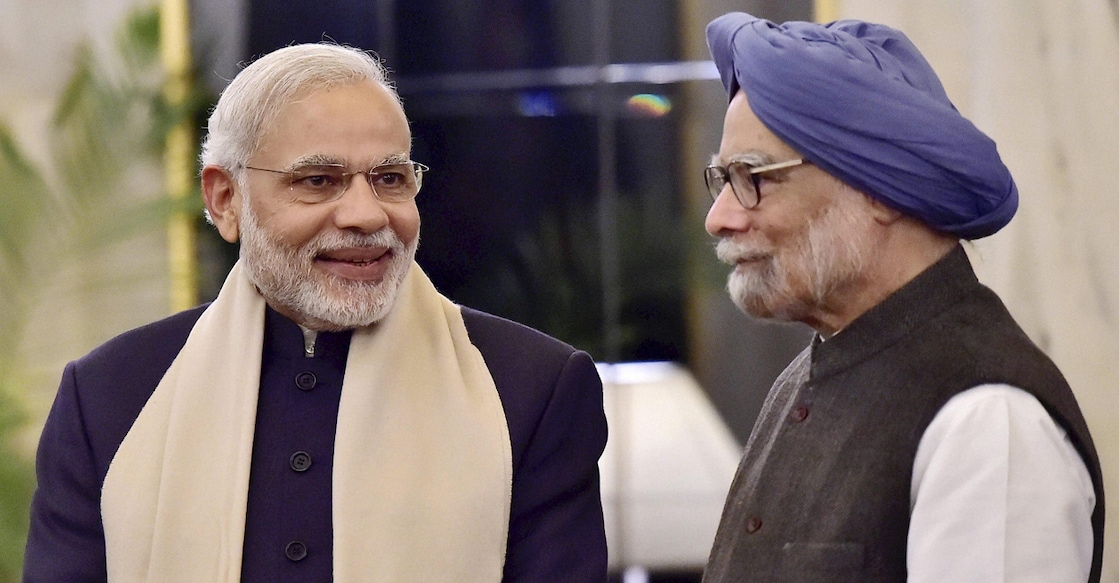 PTI12_19_2014_000268B PM Narendra Modi with Dr Manmohan Singh. File photo: PTI