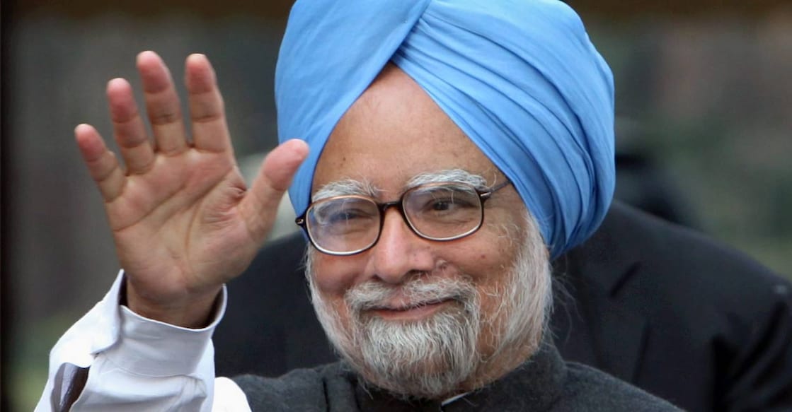 manmohan-singh-new Prime Minister Manmohan Singh waves to the media as he arrives at Parliament House in New Delhi. File Photo: PTI.