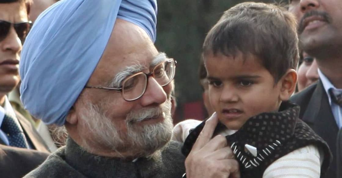 manmohan-singh-with-child-c Manmohan Singh. File Photo: PTI
