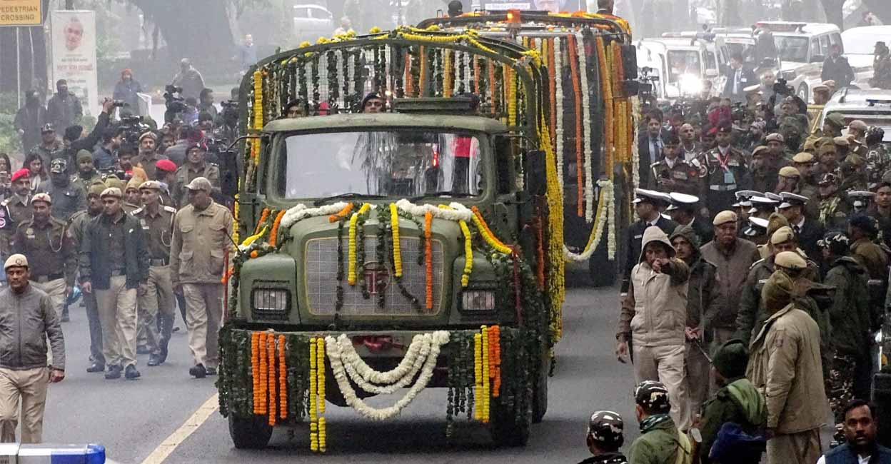 The mortal remains of former prime minister Manmohan Singh being taken to Congress headquarters for party leaders and workers to pay their last respects to him.  Photo: PTI/Kamal Singh