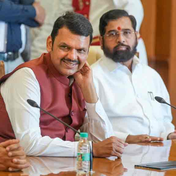 BJP leader Devendra Fadnavis with Shive Sena chief Eknath Shinde and NCP chief Ajit Pawar. Photo: PTI