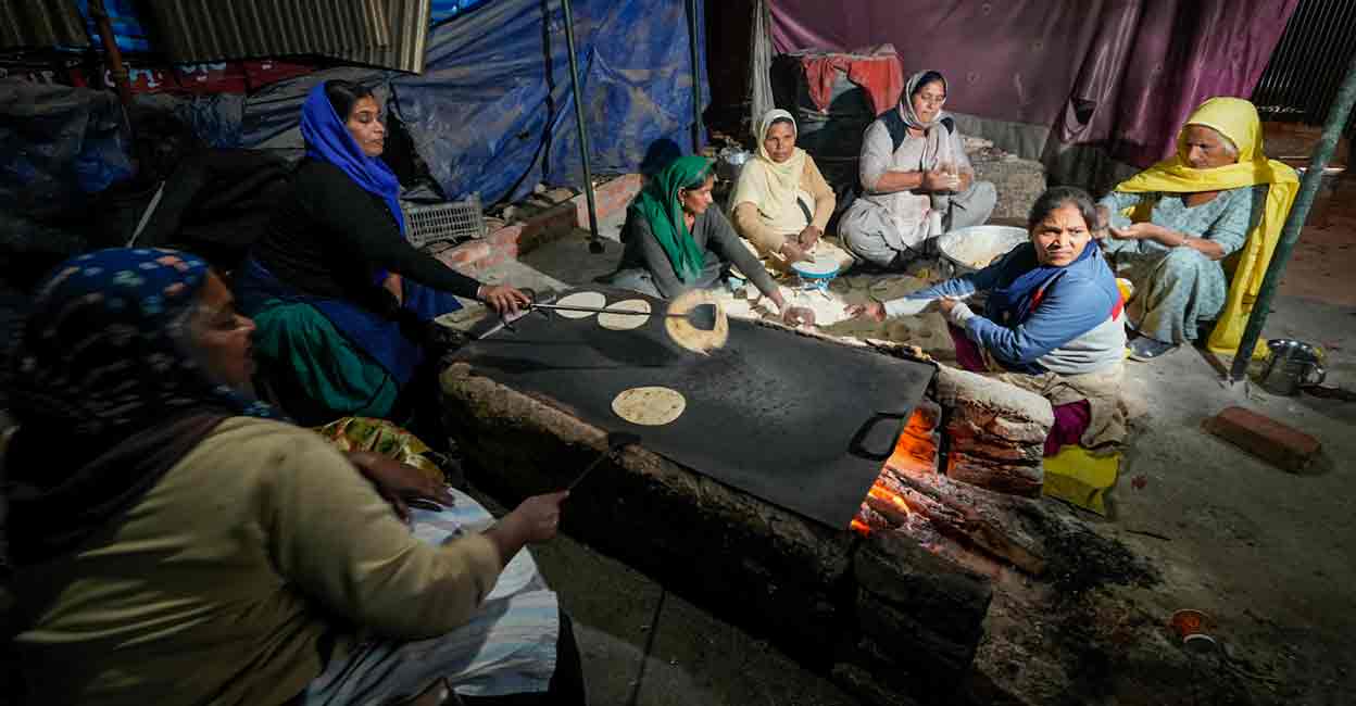 PTI12_05_2024_000450A Farmers at a makeshift shelter as they gather at the Shambhu border ahead of their proposed march to the national capital on December 6, near Patiala, Thursday, Dec. 5, 2024. Photo: PTI