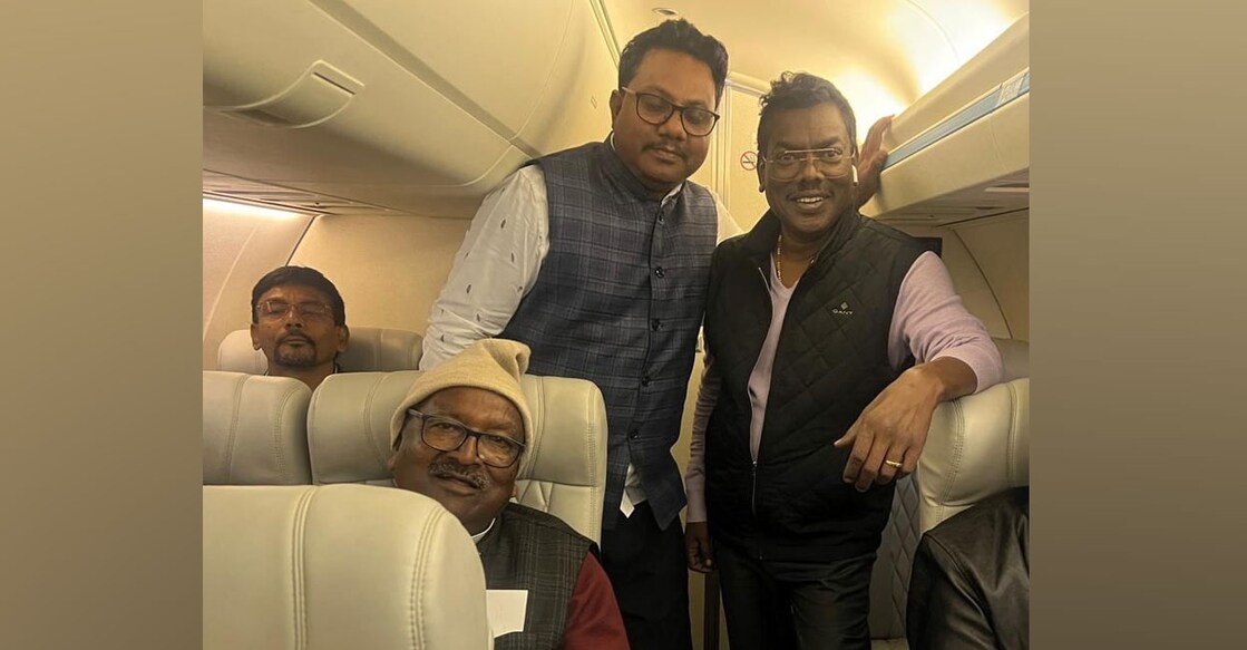 MLAs of JMM- led ruling alliance in Jharkhand onboard a flight to Hyderabad. Photo sourced via PTI