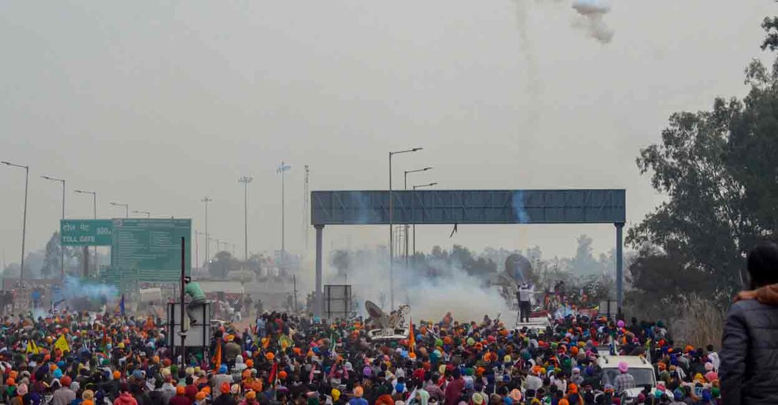 Police use tear gas to disperse farmers gathered at the Punjab-Haryana Shambhu border during their 'Delhi Chalo' march, in Patiala district, Tuesday, Feb. 13, 2024. Photo: PTI