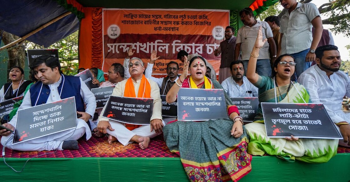 sandeshkali-bjp-dharna BJP MP Dilip Ghosh with party leader Agnimitra Paul and others during a sit-in 'dharna' against the state government over the Sandeshkhali incident, in Kolkata, Wednesday, February 28, 2024. Photo: PTI