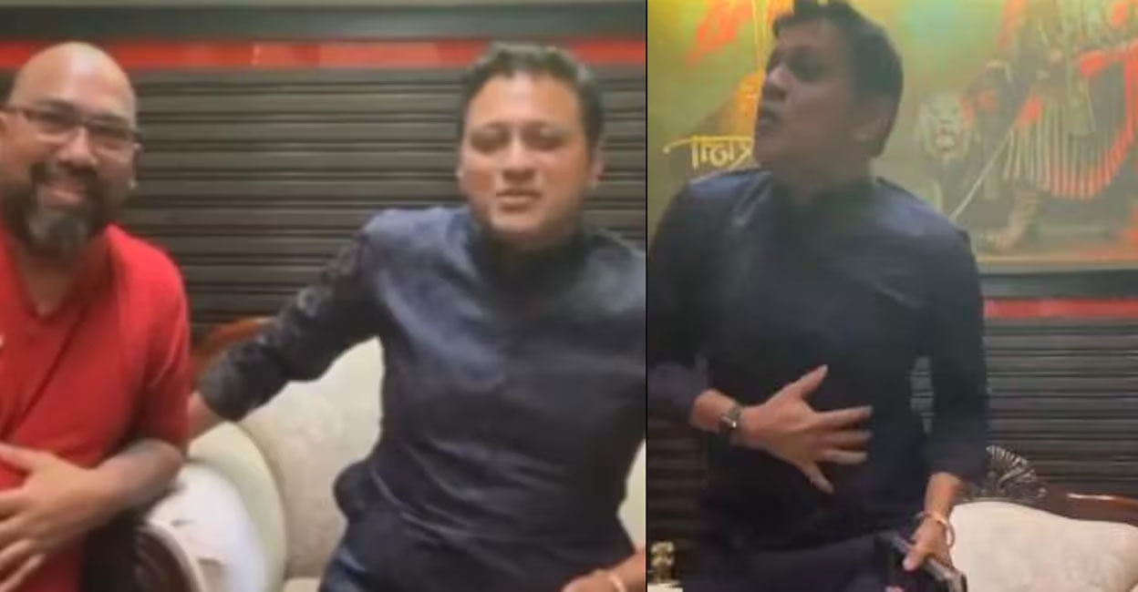 Shiv Sena (UBT-Uddhav Balasaheb Thackeray) leader Vinod Ghosalkar's son Abhishek Ghosalkar with his assailant in the Facebook Live. Photo: Screengrab/X/@srinivasiyc.