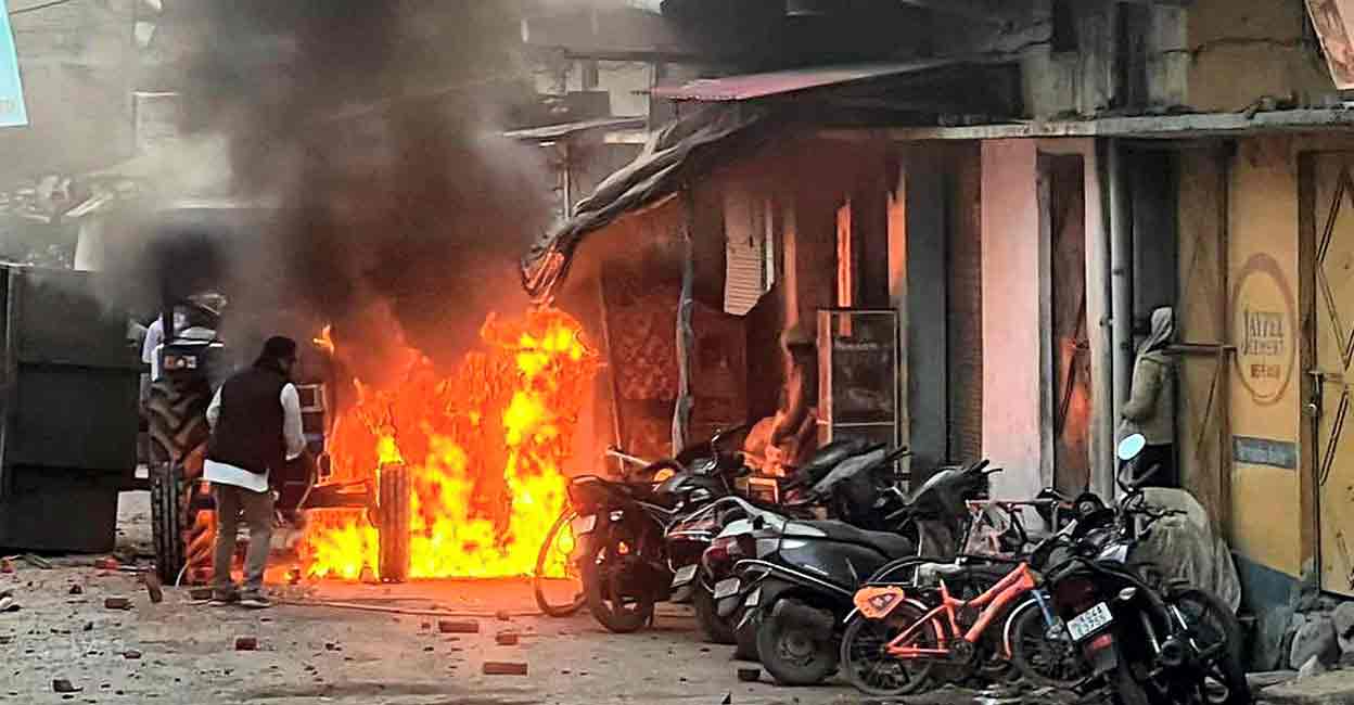 PTI02_08_2024_000415B Vehicles set on fire by miscreants over the demolition of an "illegally built" madrasa at Banbhoolpura area, in Haldwani, Uttarakhand, Thursday, Feb. 8, 2024. Photo: PTI