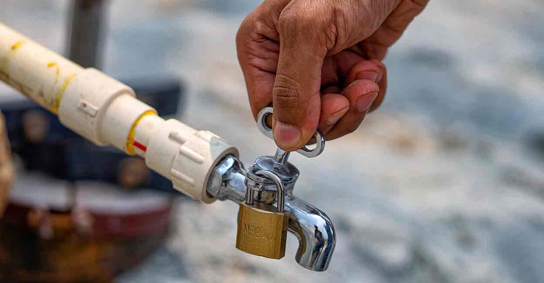 A locked water tap amid the ongoing water crisis, in Bengaluru, Thursday, March 14, 2024. Photo: PTI
