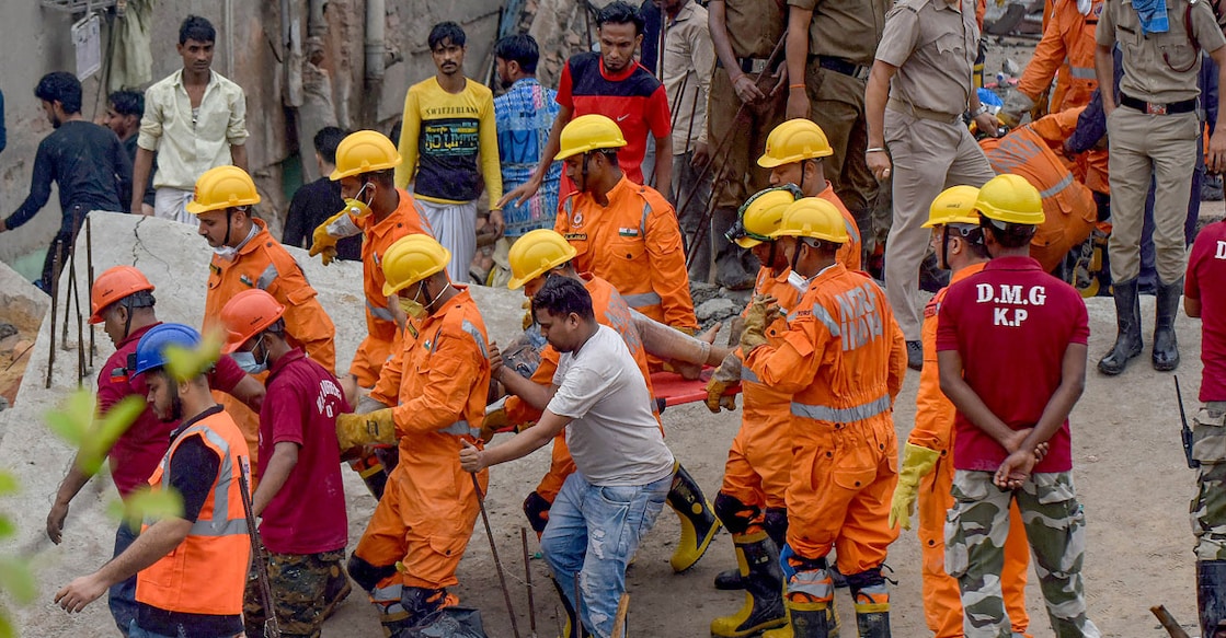 PTI03_18_2024_000036B Rescue operation underway after a five-storey under-construction building collapsed at Garden Reach area in Kolkata on Monday. Photo: PTI