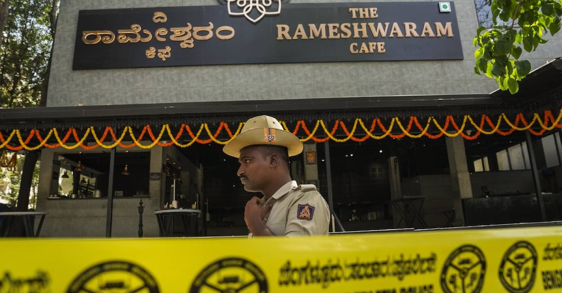  A police official stands guard at the Rameshwaram cafe blast site, in Bengaluru, Saturday. Photo: PTI