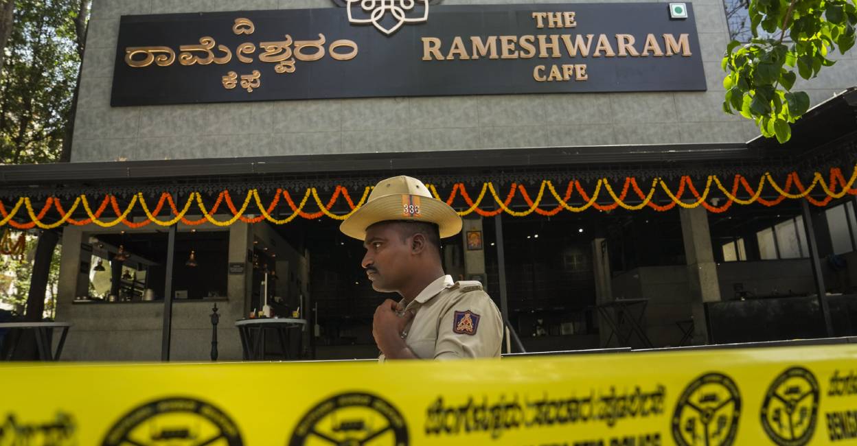  A police official stands guard at the Rameshwaram cafe blast site, in Bengaluru, Saturday. Photo: PTI
