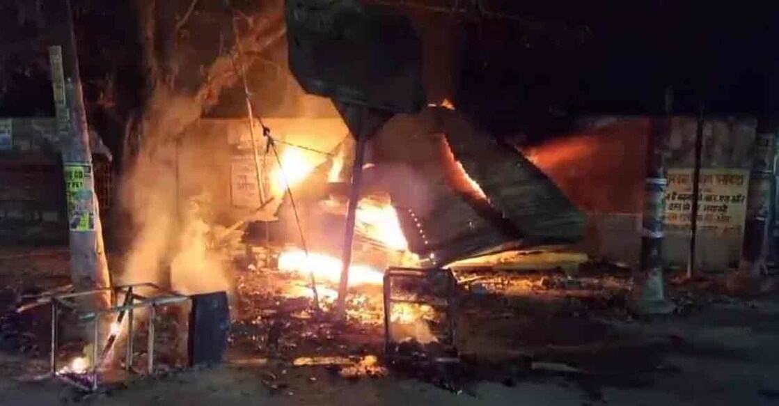  A structure set on fire by angered people after a barber allegedly killed two boys, in Budaun, Tuesday night, March 19, 2024. The accused was gunned down in an encounter hours later, according to officials. Photo: PTI