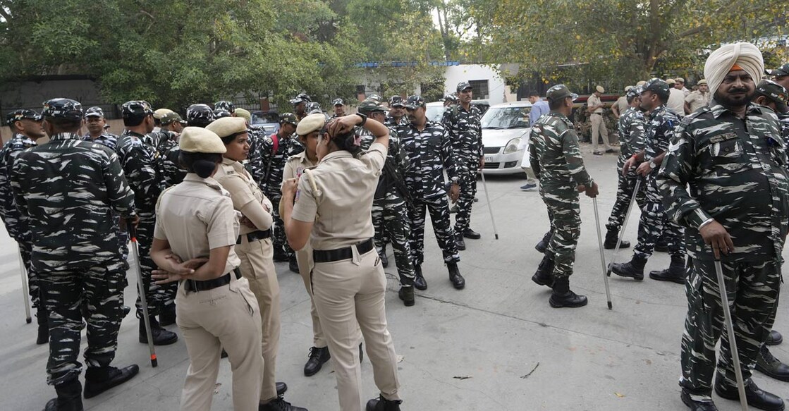 aap-protest-delhi-ls1 Security personnel deployed outside Patel Chowk metro station in view of AAP's PM residence 'gherao' protest against the arrest of Delhi CM Arvind Kejriwal, in New Delhi, Tuesday, March 26, 2024. Photo: PTI.