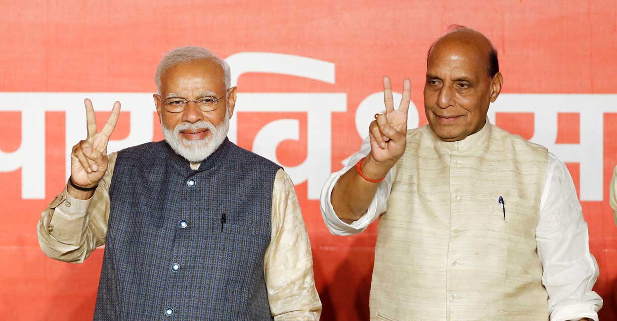 Narendra Modi and Rajnath Singh gesture after the election results in New Delhi on May 23, 2019. File photo: Reuters/Adnan Abidi