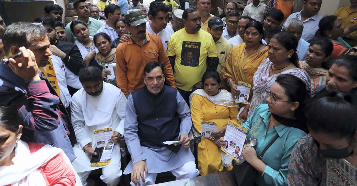 PTI03_29_2024_000064A New Delhi: AAP leader Gopal Rai during distribution of invitation pamphlets for the AAP Maha rally, in New Delhi, Friday, March 29, 2024. (PTI Photo) (PTI03_29_2024_000064A)