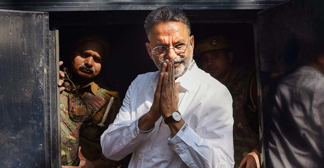In this file photo from December 28, 2022, gangster-turned-politician Mukhtar Ansari being produced at district court in Prayagraj. Photo: PTI