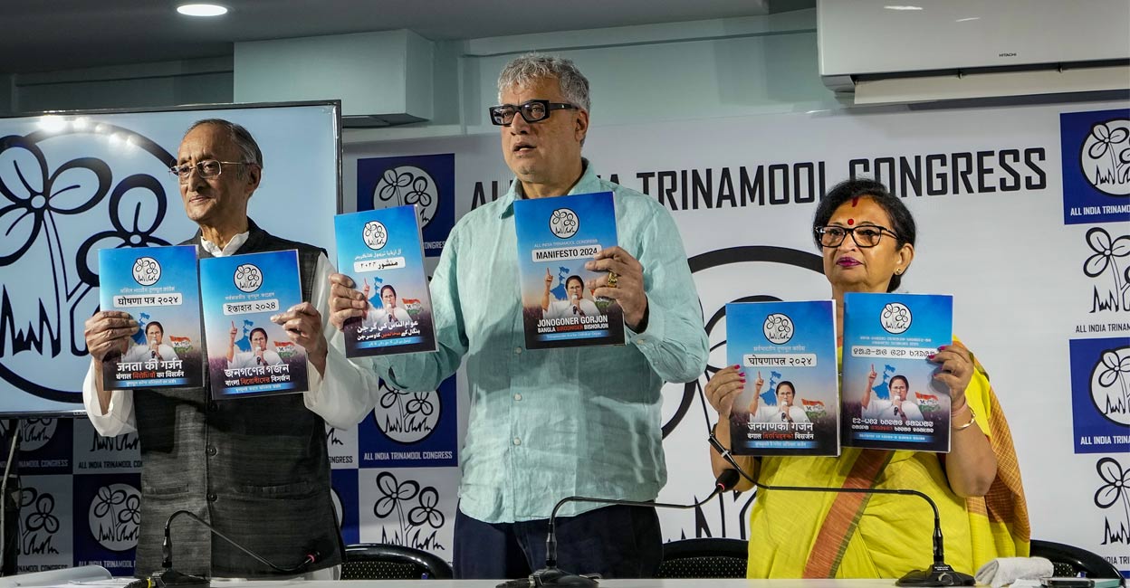 TMC leaders Amit Mitra, Derek O'Brien and Chandrima Bhattacharya release the party's election manifesto for the Lok Sabha elections, in Kolkata, Wednesday, April 17. Photo: PTI. 