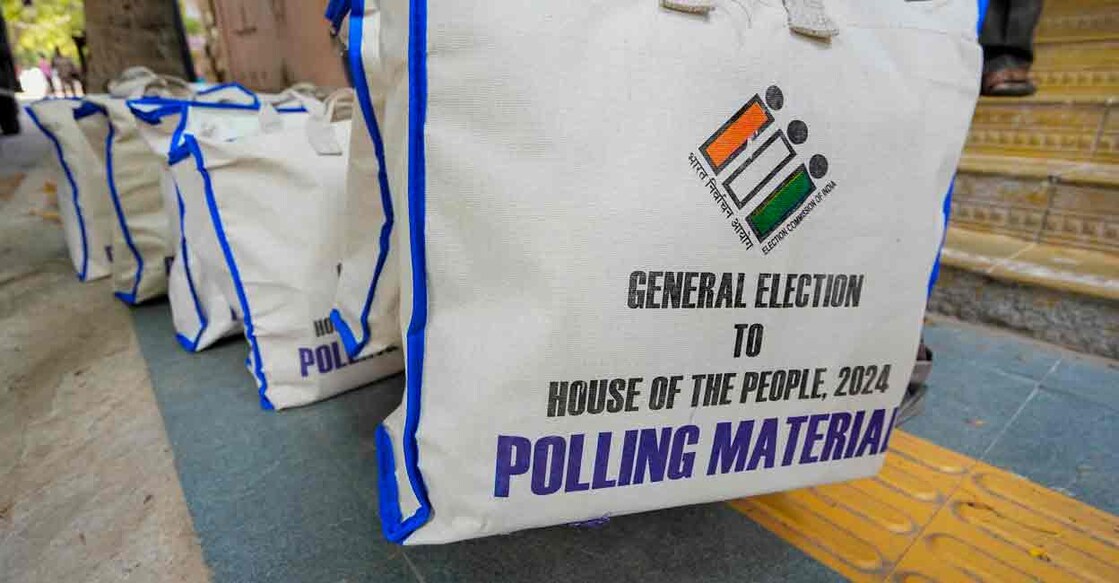 Electronic Voting Machines (EVM) and other election material being distributed from Nandanam Arts college to the respective polling booths on the eve of the first phase of Lok Sabha elections, in Chennai, Thursday, April 18, 2024. Photo: PTI