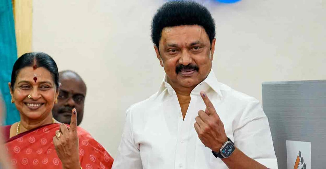 PTI04_19_2024_000035B Tamil Nadu Chief Minister MK Stalin and his wife show their fingers marked with indelible ink after casting their votes for the first phase of Lok Sabha elections, at a polling station in Chennai, Friday, April 19, 2024. Photo: PTI