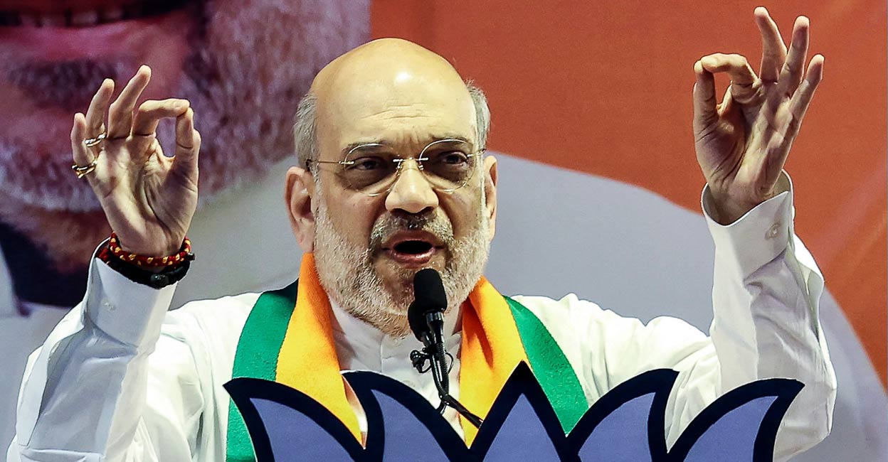 Home Minister and Bharatiya Janata Party (BJP) leader Amit Shah gestures as he speaks during a BJP public meeting in Varanasi on April 24, 2024, ahead of the second phase of voting of the country's general election. Photo: AFP via PTI. 