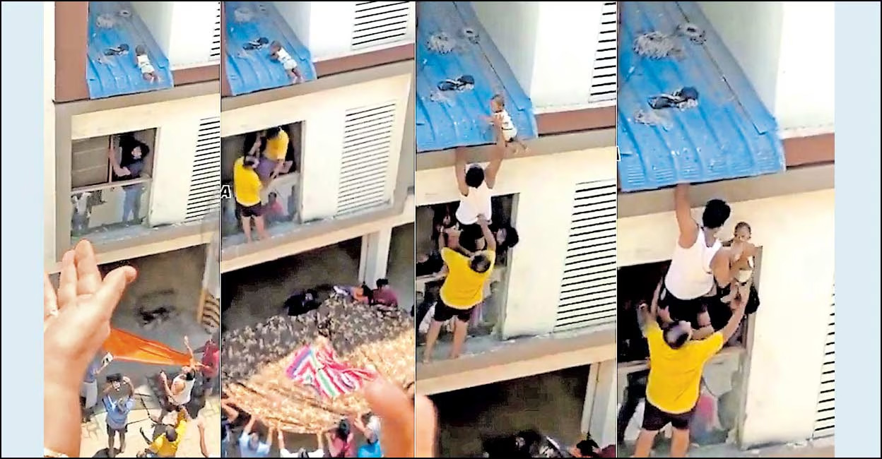 Chennai kid rescue Kanmani Anbodu... The dramatic rescue operation at a flat near Avadi, in Chennai. 1) The baby fell onto a sheet on the parapet of the second floor, with people gathering below the apartment. 2) Individuals attempted to retrieve the baby through a ground floor window, with a thick bed sheet positioned below for safety. 3) Hariprasad (wearing a white vest) climbs up and skillfully grabs the baby with one hand. 4) The baby was brought down safely to the others with great care. Photo: Manorama