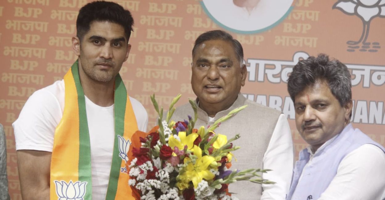 The boxer joined the BJP in the presence of the party's national General Secretary Vinod Tawde. Photo: IANS
