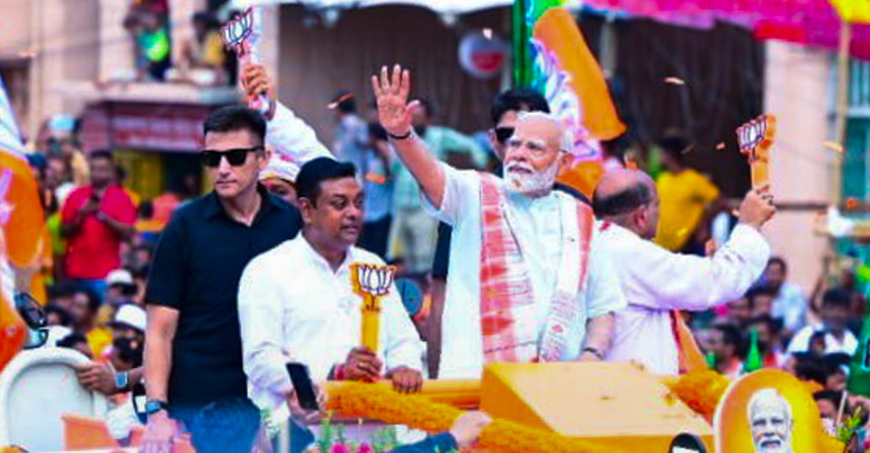 Sambit Patra with Prime Minister Narendra Modi during a roadshow for Lok Sabha elections in Puri on Monday. Photo: PTI