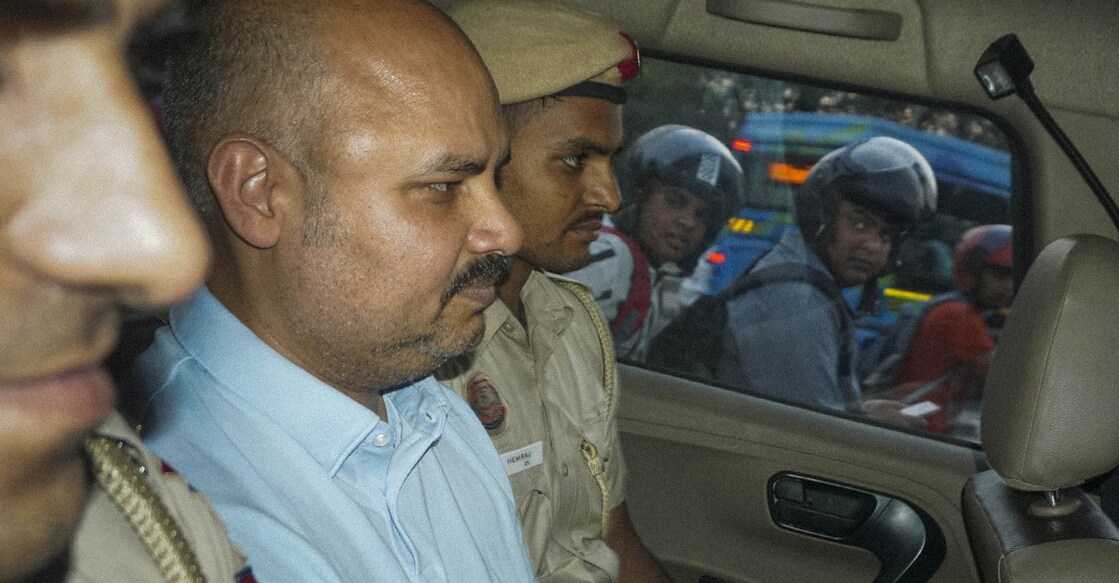 Bibhav Kumar leaving Kejriwal's residence after recreation of the scene in Swati Maliwal's assault case. Photo: PTI.