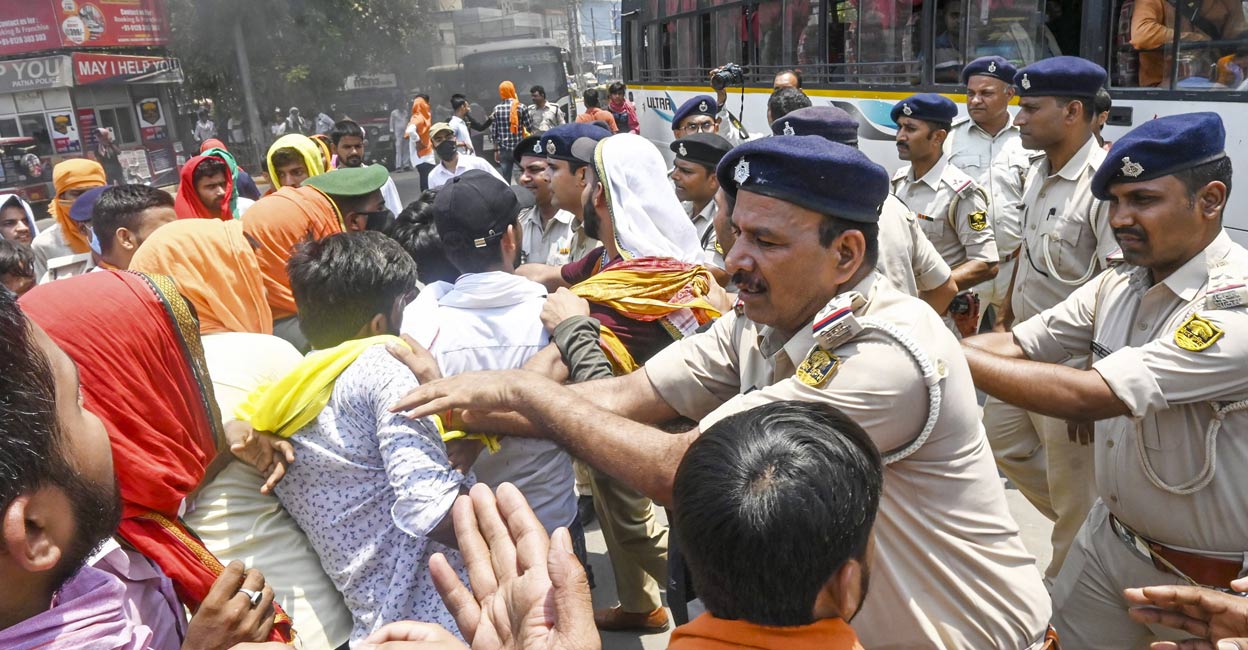 patna-student-death-protest-ls Police detain students of BN College during a protest after a final year student was beaten to death by some unidentified persons on the law college campus of Patna University, in Patna, Tuesday, May 28, 2024. Photo: PTI.