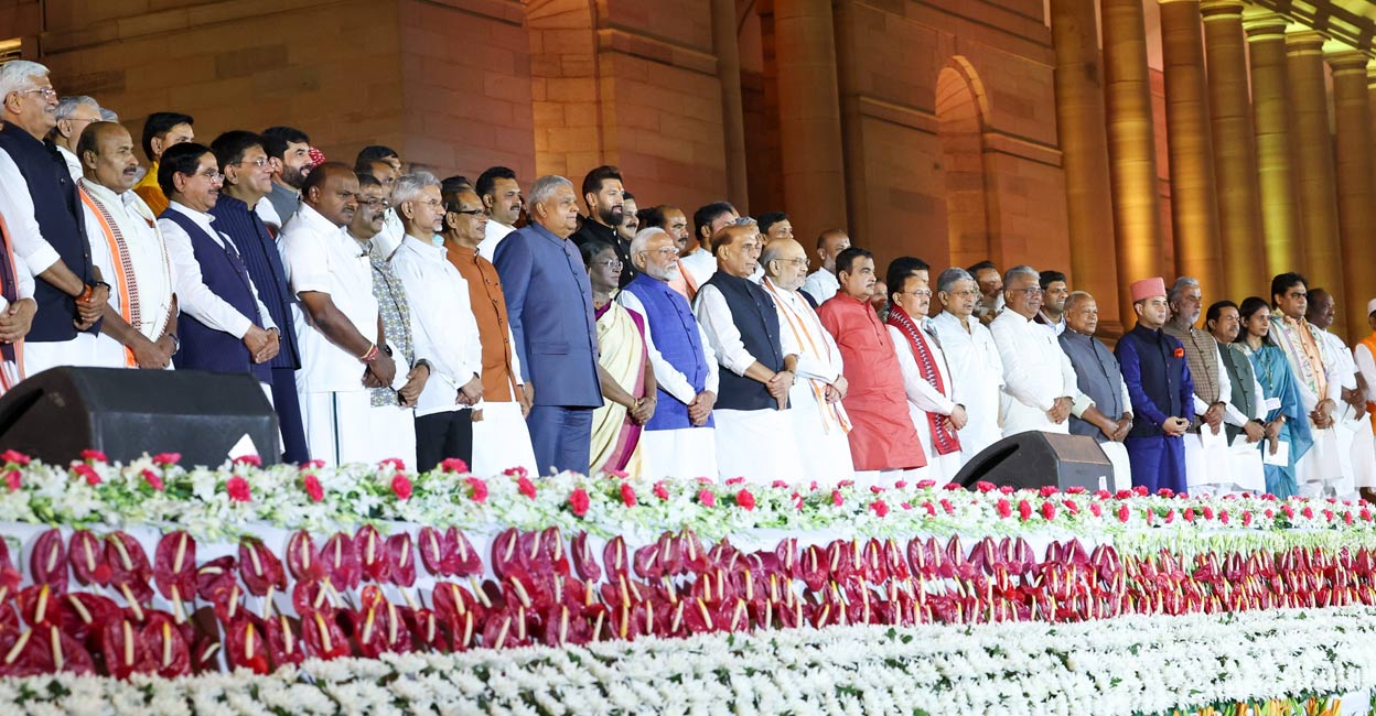 President Droupadi Murmu and Vice President Jagdeep Dhankhar with Prime Minister Narendra Modi and other ministers at the swearing-in ceremony of new Union government, at Rashtrapati Bhavan in New Delhi, Sunday, June 9, 2024. Photo: PTI. 