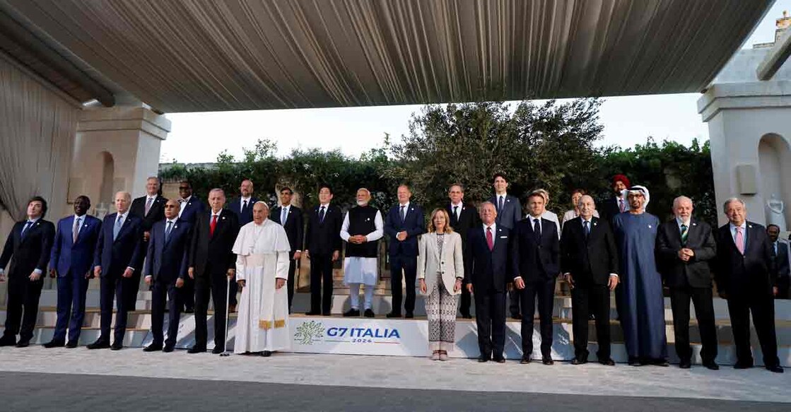 (First row Left side) Argentine's President Javier Milei, Kenya's President William Ruto, US President Joe Biden, Mauritania's President Mohamed Ould Ghazouani, Turkish President Recep Tayyip Erdogan and Pope Francis (6th-L) and (First row Right side - From L) Italy's Prime Minister Giorgia Meloni, Jordan's King Abdullah, France's President Emmanuel Macron, Algeria's President Abdelmadjid Tebboune, United Arab Emirates’ President Sheikh Mohamed bin Zayed Al Nahyan, Brazilian President Luiz Inacio Lula da Silva, UN Secretary-General Antonio Guterr (Second row), President of the European Council Charles Michel (3rd-L), British Prime Minister Rishi Sunak (4th-L), Japanese Prime Minister Fumio Kishida (5th-L), India's Prime Minister Narendra Modi (6th-L), German Chancellor Olaf Scholz (7th-L) and Canada's Prime Minister Justin Trudeau (8th-L) pose for a photo with G7 heads of States and heads of delegation of Outreach countries at Borgo Egnazia resort during the G7 Summit hosted by Italy, in Savelletri, on June 14, 2024. Photo: Ludovic MARIN / AFP