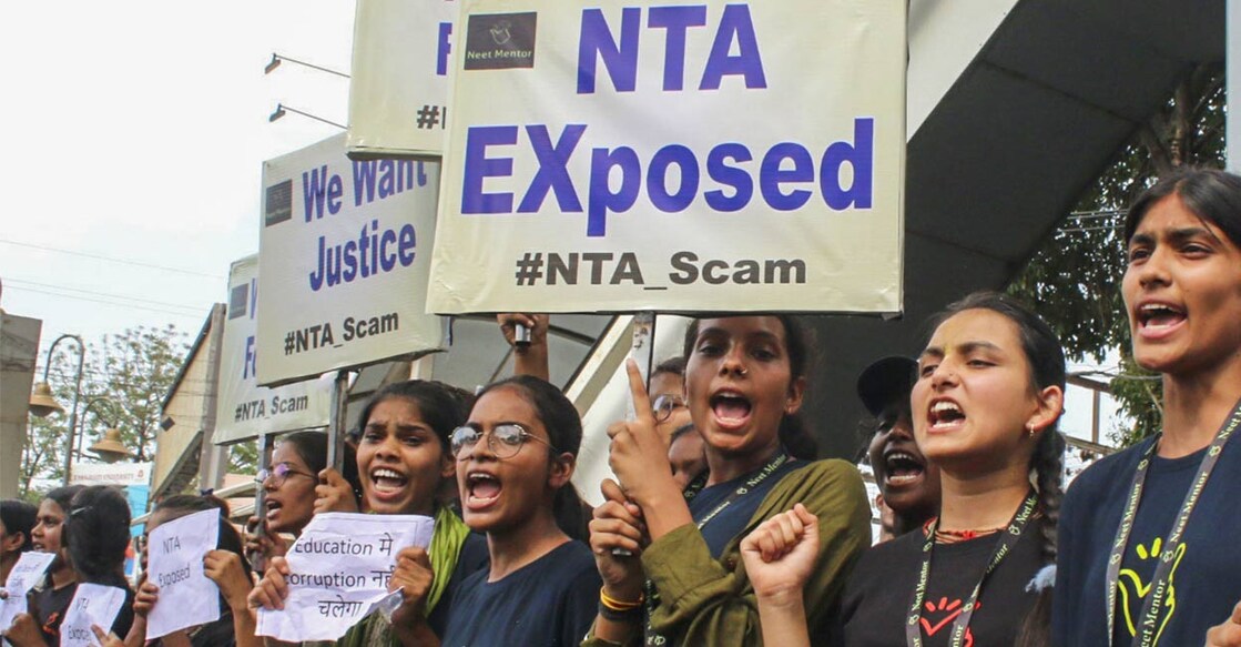 Students raise slogans during a protest over the alleged irregularities in NEET 2024 results, in Bhopal, Friday, June 14, 2024. Photo: PTI. 