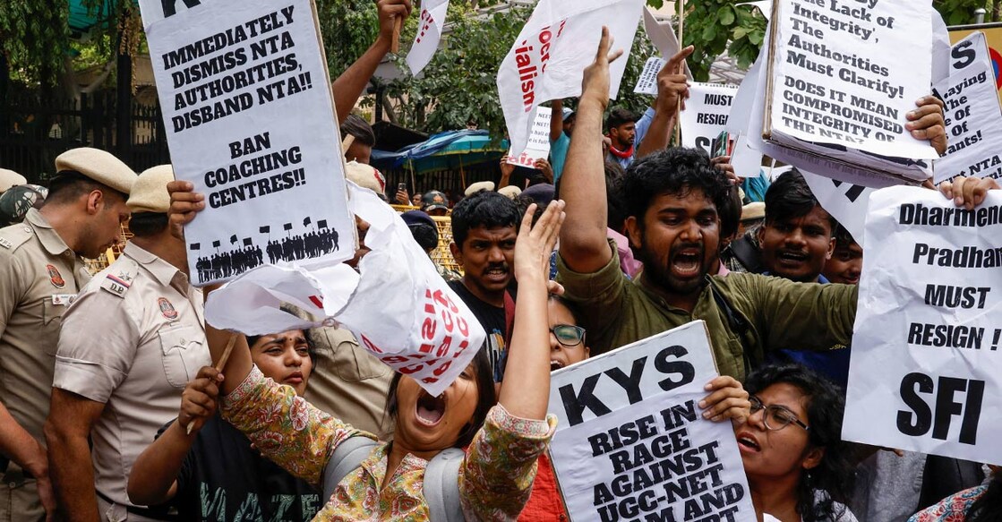 Students holding placards protest outside the Ministry of Education against the cancellation of the UGC-NET examination at New Delhi, India, June 20, 2024. Photo: PTI. 
