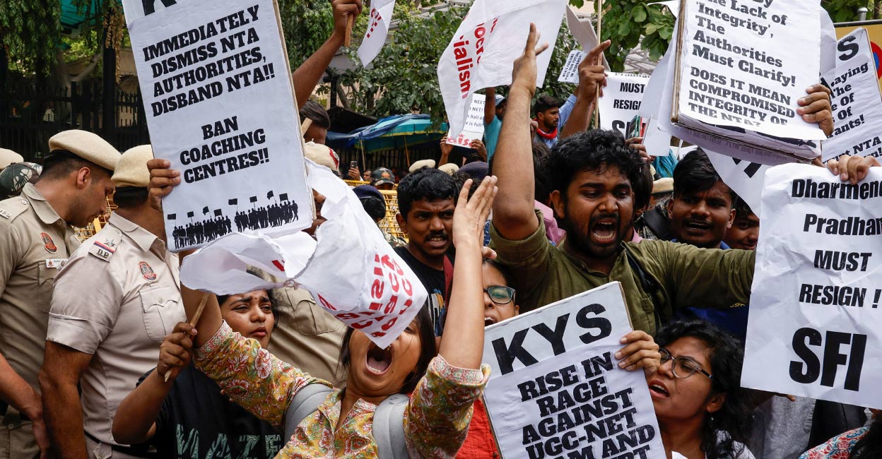 Students holding placards protest outside the Ministry of Education against the cancellation of the UGC-NET examination at New Delhi, India, June 20, 2024. Photo: PTI. 