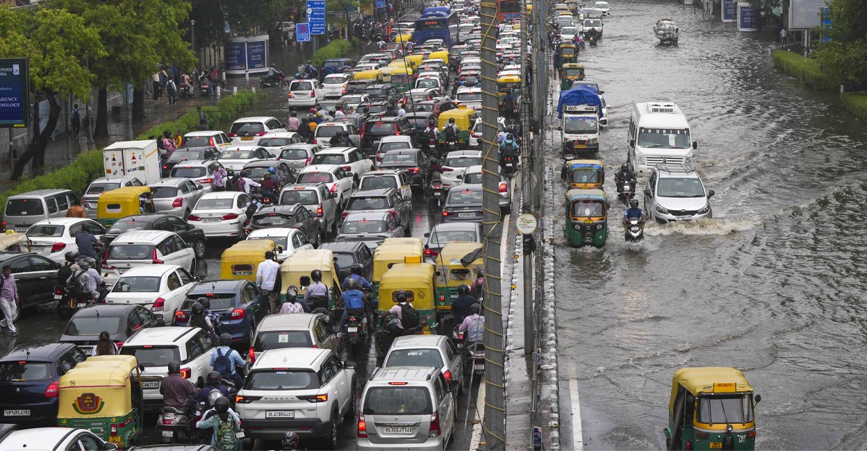 Vehicles stuck in a traffic jam at ITO amid waterlogging after rain, in New Delhi, Friday, June 28, 2024. Photo: PTI.