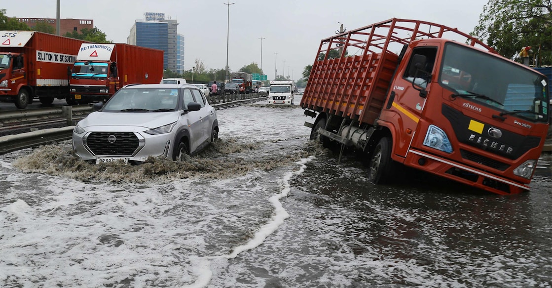 Delhi monsoon Vehicles move through a waterlogged road at the Delhi-Jaipur expressway after heavy rainfall. Photo: Vinay GUPTA / AFP via PTI.