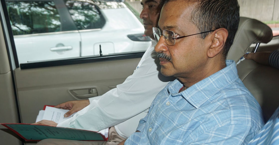 Delhi CM and AAP leader Arvind Kejriwal being brought to a court by CBI officials, in New Delhi, on Saturday. Photo: PTI