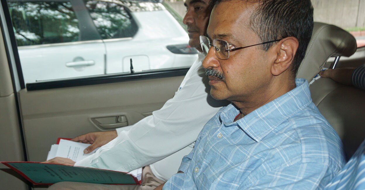 Delhi CM and AAP leader Arvind Kejriwal being brought to a court by CBI officials, in New Delhi, on Saturday. Photo: PTI