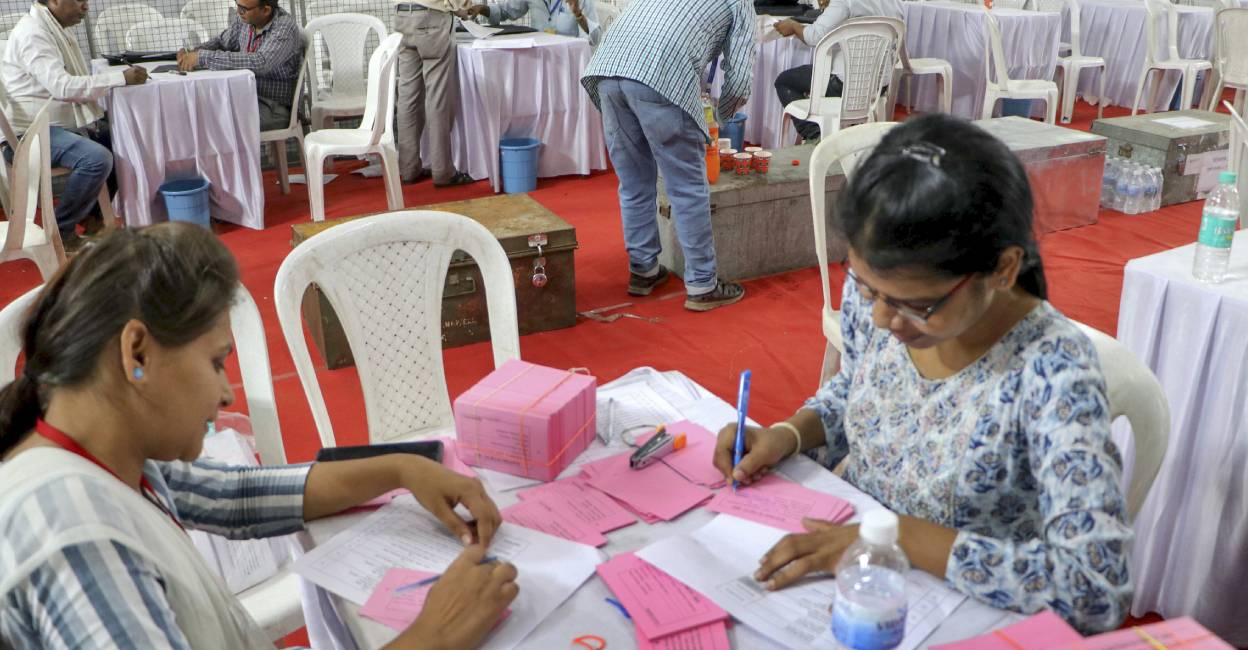 Polling officials carry out preparations at a counting centre, a day before counting of votes for the Lok Sabha elections, in Nagpur. Photo: PTI