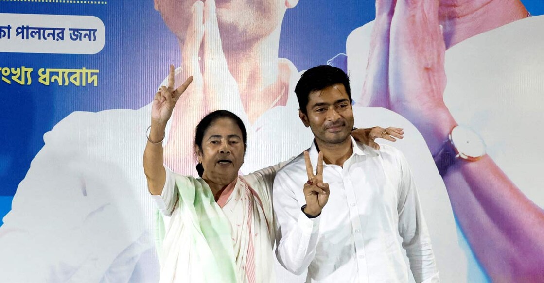 wb-aitc-new-c West Bengal Chief Minister Mamata Bannerjee and her nephew Abhishek Banerjee, gesture after Abhishek won a seat on the day of the general election results in Kolkata. Photo: PTI